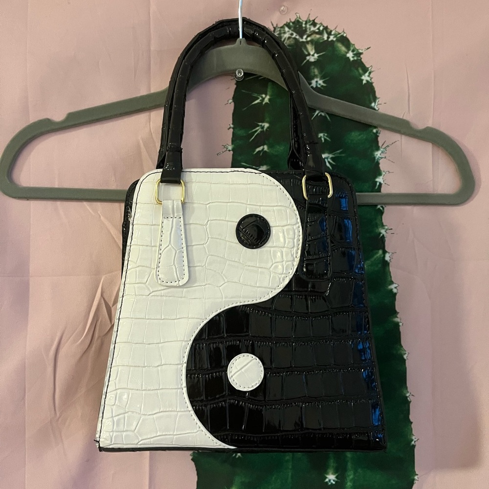 Patent leather yin and yang purse